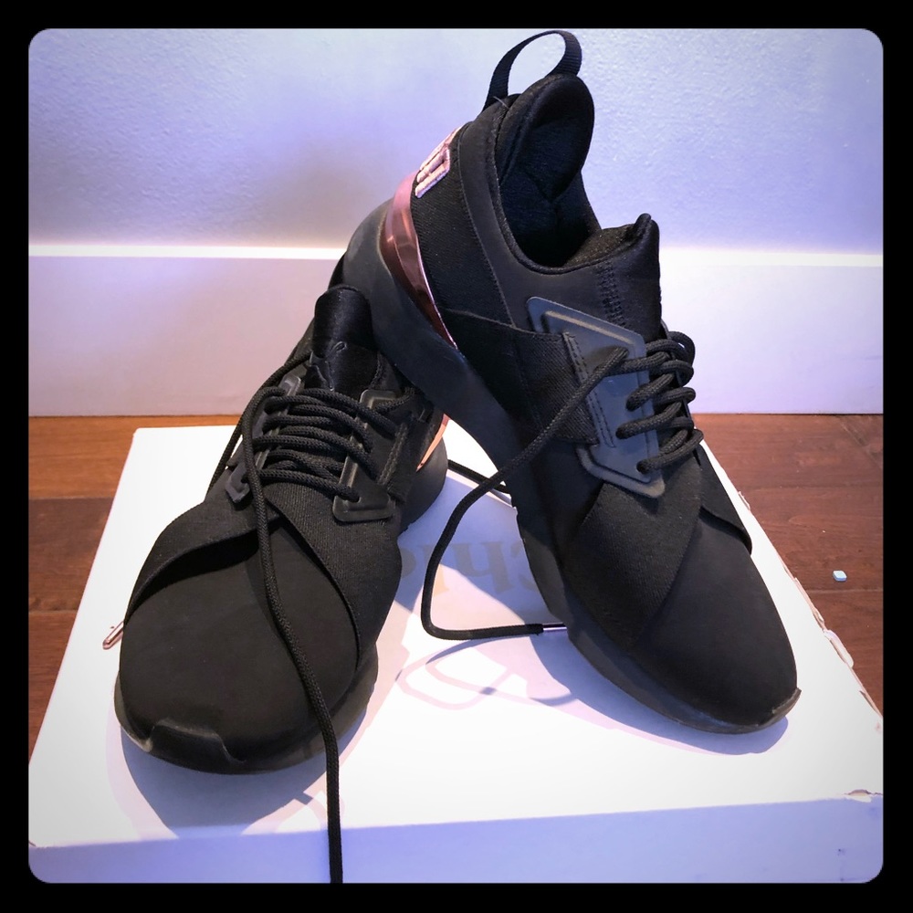 Puma rose gold and black sneakers